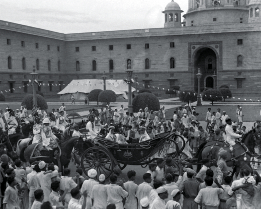 The ceremonial coach carrying Lord and Lady Mountbatten at a point between South Block (to the right) and North Block. The ceremonial coach carrying Lord and Lady Mountbatten at a point between South Block (to the right) and North Block.