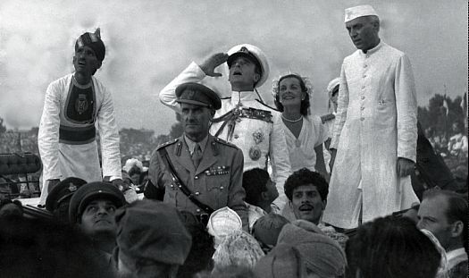 Lord Mountbatten saluting the Indian flag, with Lady Mountbatten and Nehru to his left. Lord Mountbatten saluting the Indian flag, with Lady Mountbatten and Nehru to his left.