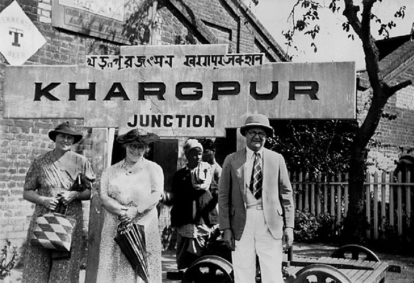 Dad and Mother seeing a friend off at Khargpur Junction. The sign is written in Bengali (top left), Hindi (top right), and English. The post office spelled it Kharagpur, in a show of independence from the railway authorities. Khargpur Junction