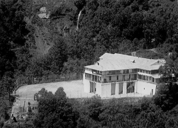 The Boys’ Hostel with Woodstock spring and falls in the background, the source of fresh water for the swimming pool on the other side of the building. The senior boys had their beds on the upper veranda. The near wing housed faculty. The photo might have been taken by my brother John after the end of the senior year in December 1937 at a moment of unusual quiet–not a single person in sight! Woodstock school boys hostel