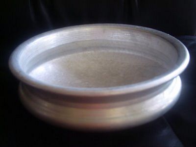 An uruli – a brass utensil used in Kerala. An uruli – a brass utensil used in Kerala